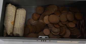 A collection of coins, largely pennies t