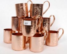 A set of copper Smirnoff Moscow Mule mug
