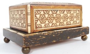 A 1920's bone and wood inlaid musical ci