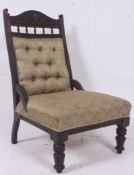 A Victorian mahogany ladies armchair rai