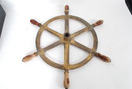 A Mid - 20th century bronze and wood shi