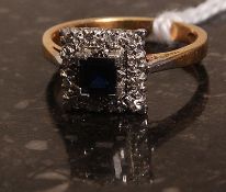 An 18k gold sapphire and diamond ring. W