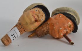 Two vintage novelty bottle pourers - in