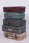 A stack of four vintage suitcases etc, o