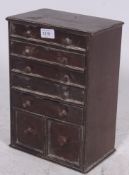 An early 20th century miniature apprenti