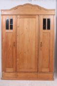 A French pine triple wardrobe armoire ra