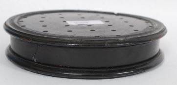 A 19th century ebonised wooden ivory sol