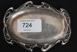 A collection of silver items to include