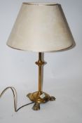 A 19th century brass tripod table lamp r
