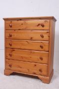 A modern good quality pine chest of draw