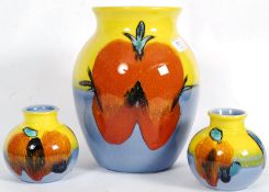 A large Poole Pottery drip glaze vase of
