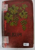 A vintage Edwardian postcard album to in