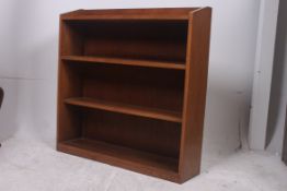 An early 20th century golden oak open wi