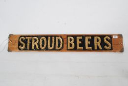 A vintage pressed metal mounted brewery