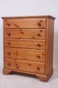 A modern good quality pine chest of draw