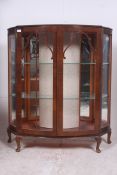 A 1930's Art Deco walnut display cabinet