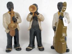 A vintage trio of ceramic black jazz mus