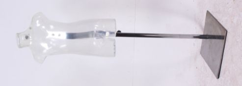 A retro styled clear plastic tailors dum