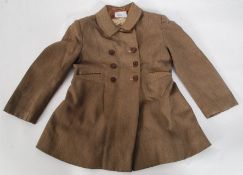 A vintage mid century child's Taylor mad