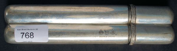 A 20th century silver plate cigar holder