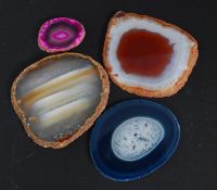 A collection of 4 slices of agate minera