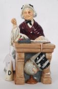 A ROYAL DOULTON FIGURE 