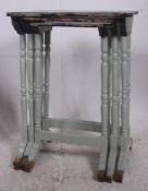 A set of three graduating painted ebonis