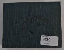 A vintage Kodak photo album containing a