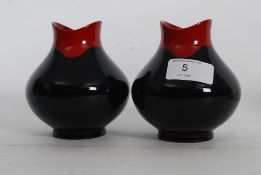 A pair of Royal Doulton Flambe 1605 tuli