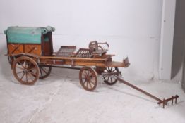 A large model of a wooden gypsy caravan