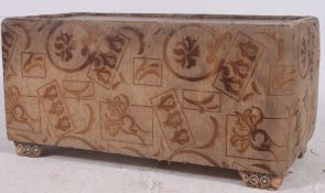 A 1950's retro upholstered coffee table