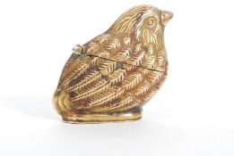 A vintage brass match vesta case in the