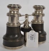 A pair of ebonised and silver plated ope