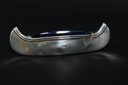A hallmarked solid silver and blue glass