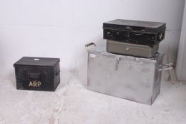 A stack of vintage metal deed boxes and