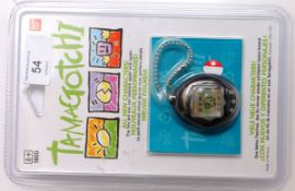 An original 1996 Tamagotchi cyber pet by