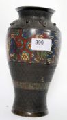 A Chinese 19th century bronze vase hammered in relief having banded centre decorated with