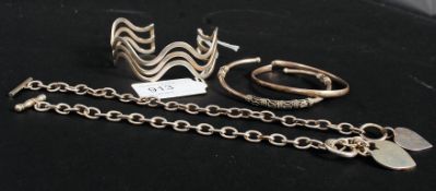 A collection of 5x white metal / silver items to include bracelets, bangles etc.