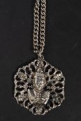 A good quality white metal Indian large deity pendant and chain. The fret pierced pendant with