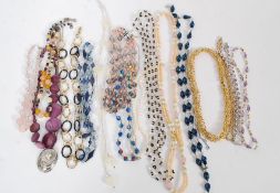 A collection of necklaces to include glass beads, faux, gold plated etc
