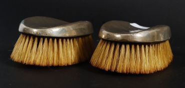 A pair of hallmarked silver clothes bruses