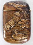 An early 20th century decorated bronze / brass match vesta case, being highly detailed depicting a