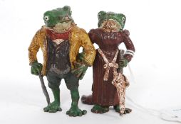 A 20th century Bergman style cold painted bronze of Mr & Mrs Toad.