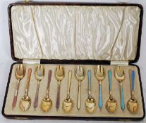 Suckling Ltd, Birmingham, 1957. Set of 12 hallmarked silver and enamel painted spoons. Enamel