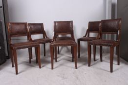 A set of 6 1930's Art Deco walnut and leather French dining chairs. Raised on squared supports