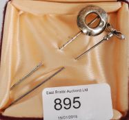 Two antique white metal ladies hat pins one in the form of a bow and another. Weight 4,3g.