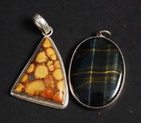 Two silver pendants with inset stones one being moss agate, the other labradorite. Combined GW 29.