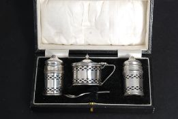 A cased hallmarked silver  pierced condi