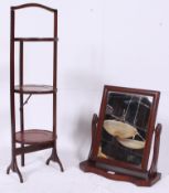 An Edwardian mahogany metamorphic 3 tier