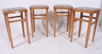 A set of 4 1950's beechwood and pad upho